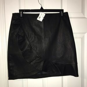 Black leather skirt with ruffles going across